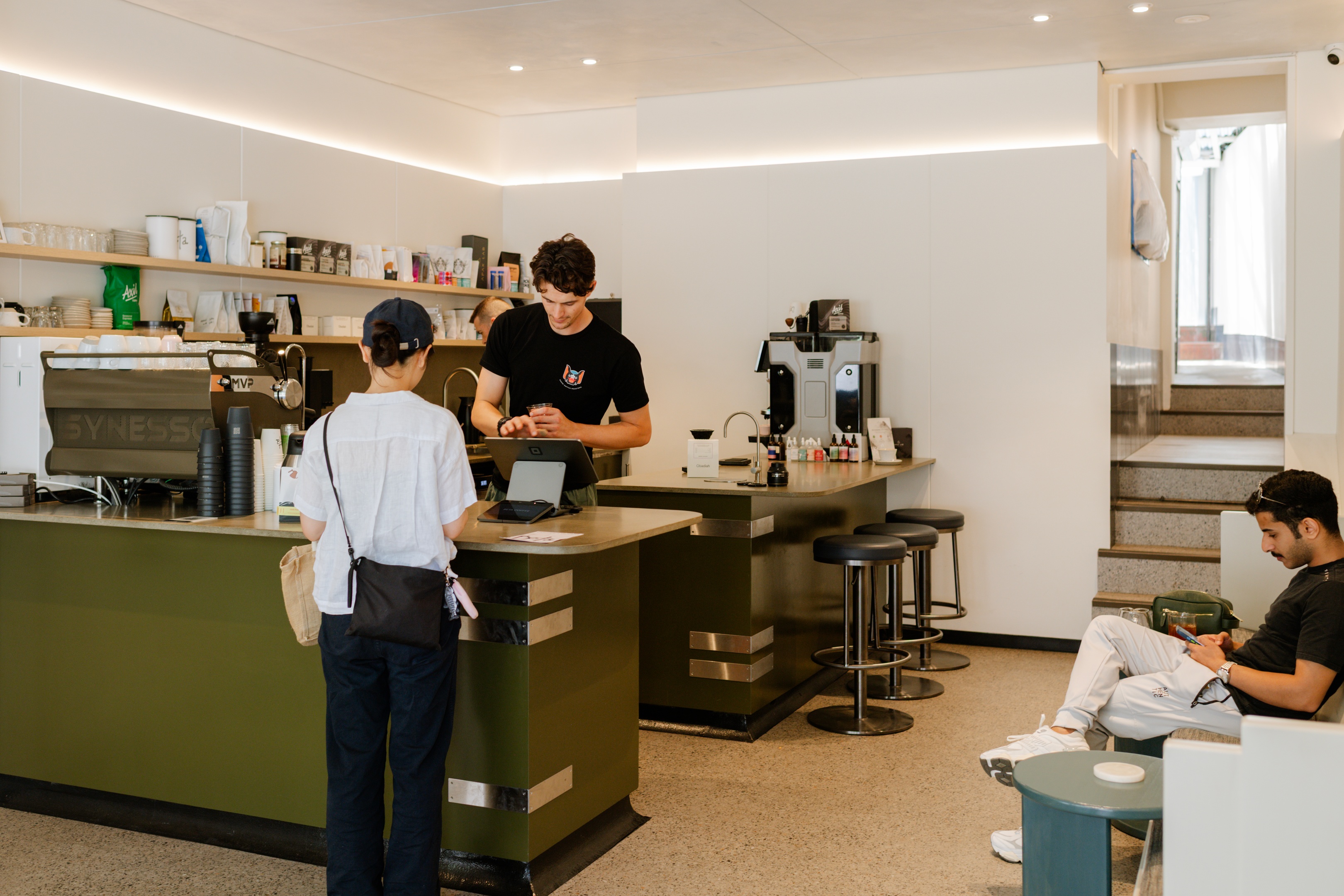 Beta Coffee is equipped with a manual Synesso espresso machine (left) and a